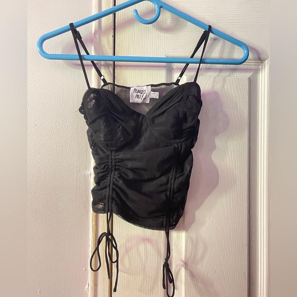 Black mesh corset top. Never worn but doesn’t have tags.